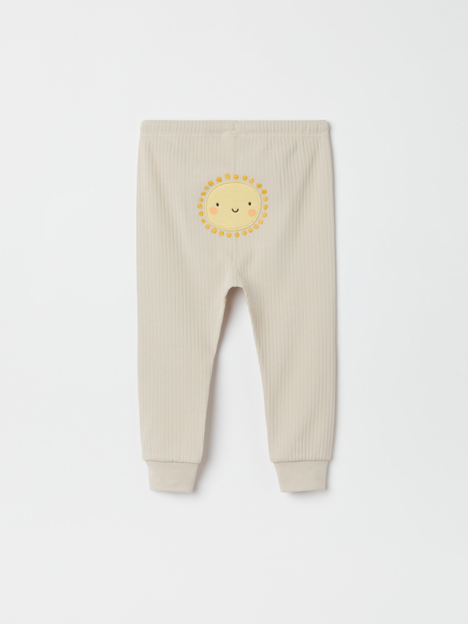 Ribbestrikket bukse med applikasjon sol