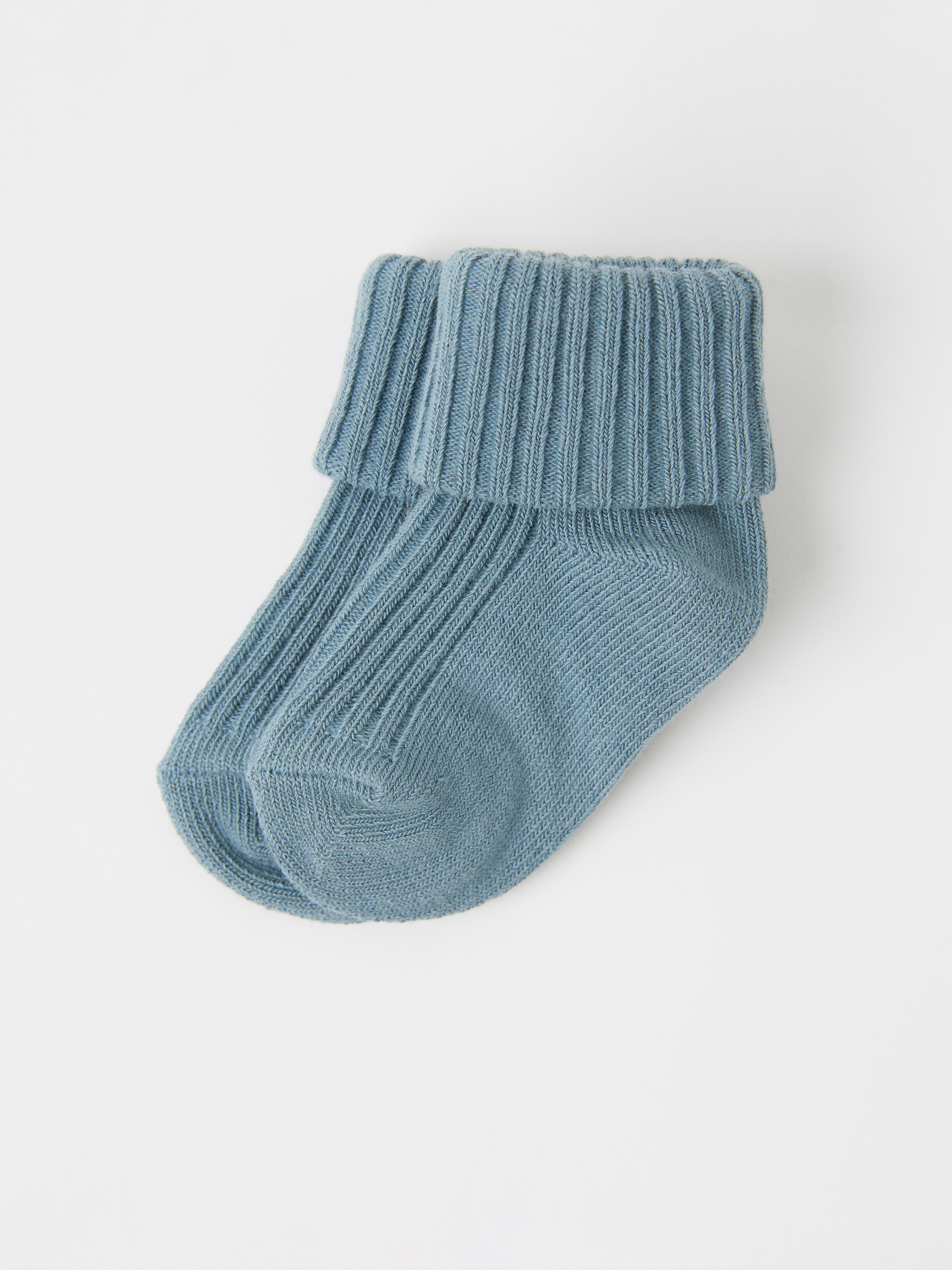 Ensfargede sokker baby blå/gray
