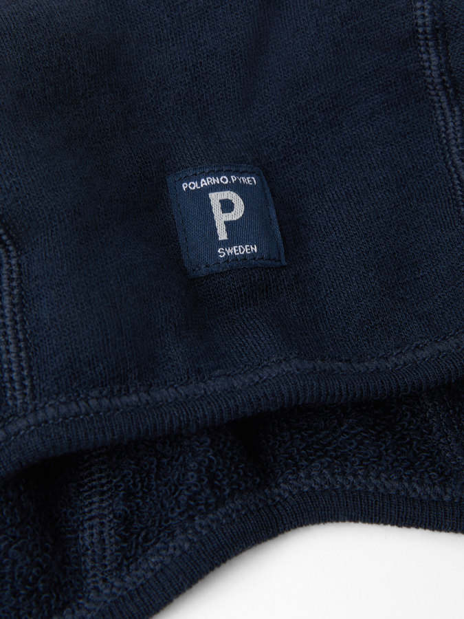 Hjelmlue ullfrotté i merino Hjelmlue ullfrotté i merino