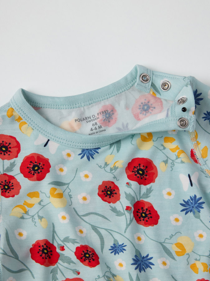Kortermet body blomstret