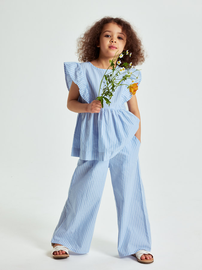 Vevd bluse med volanger stripet