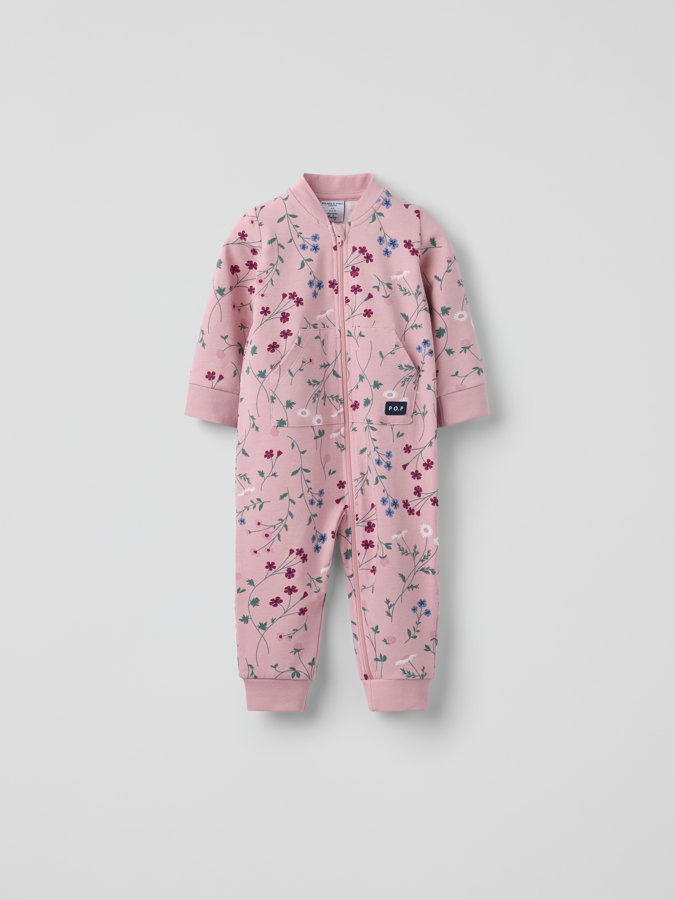 Sweatsoverall med lomme blomstrete
