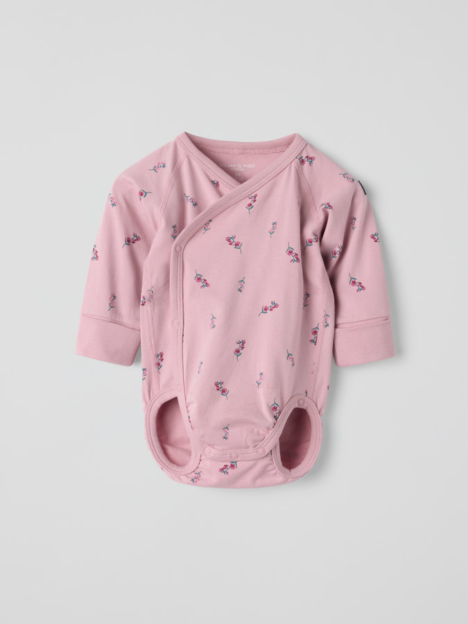 Forlengbar omslagsbody blomstrete