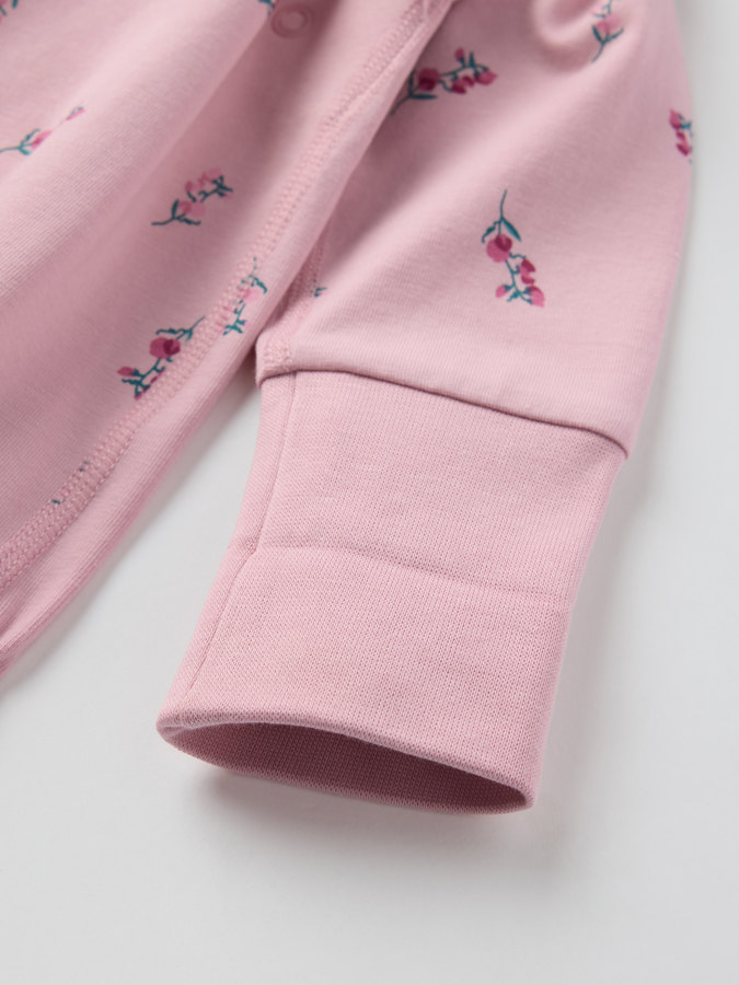 Forlengbar omslagsbody blomstrete