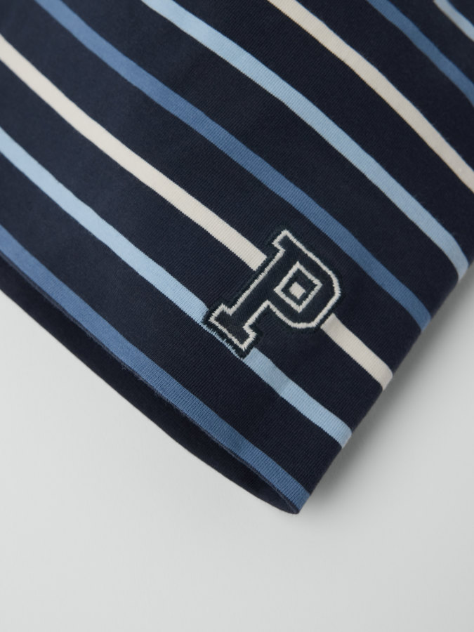 Trikotlue P-applikasjon stripet