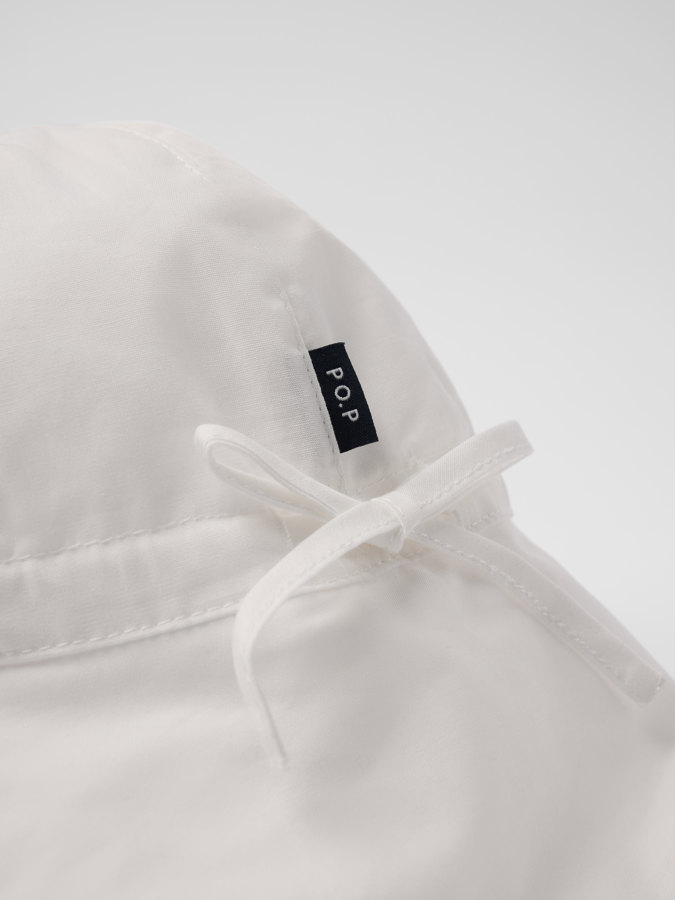 Vevd UV-cap med ører