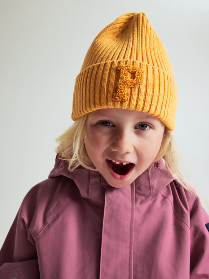 Ribbestrikket lue P-applikasjon Ribbestrikket lue P-applikasjon