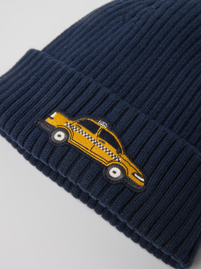 Ribbestrikket lue P-applikasjon Ribbestrikket lue P-applikasjon